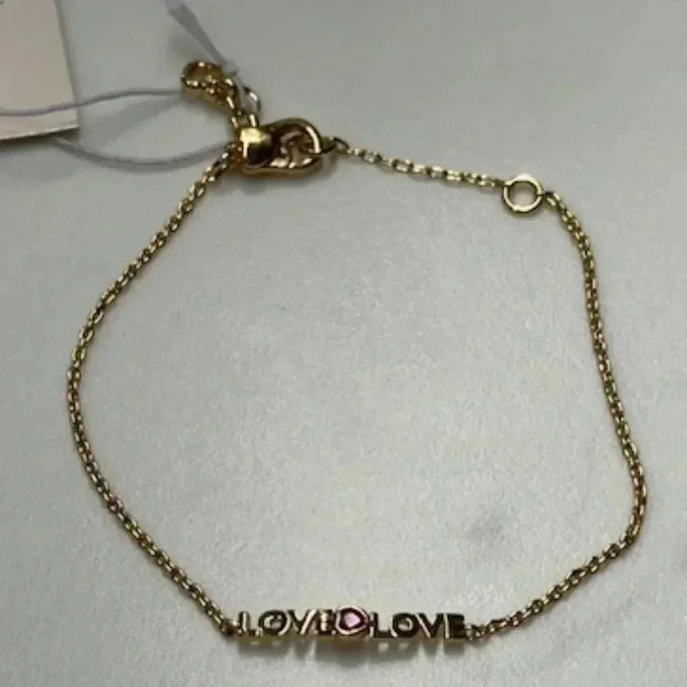 3 items Kate Spade Love Earrings and Bracelet NWT + Dustbag - Picture 2 of 5
